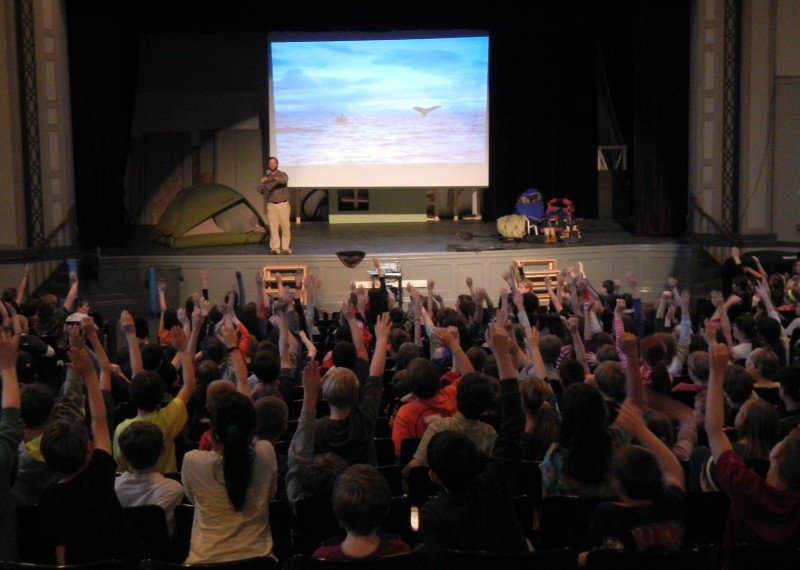 Dave and Amy Freeman present during a school assembly