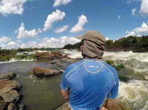 Dave stands below Inferno Rapids.